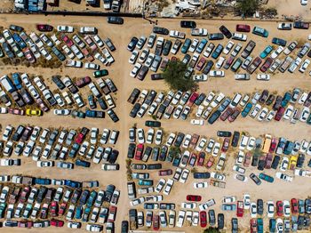 High angle view of multi colored umbrellas in row