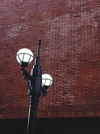 Low angle view of illuminated street light
