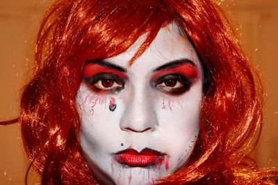 Close-up portrait of young woman with face paint during halloween