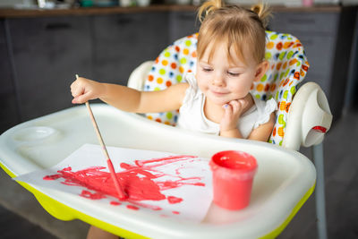 Close-up of cute girl eating food