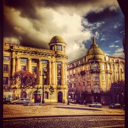 View of building against cloudy sky