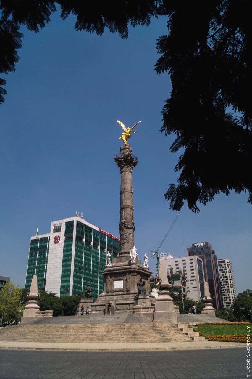 statue, travel destinations, memorial, city, architecture, monument, outdoors, no people, tree, cityscape, sculpture, sky, day