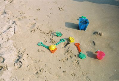 High angle view of toy on sand at beach