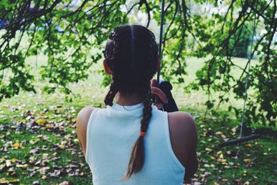 Rear view of woman outdoors