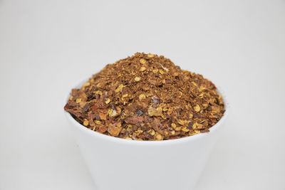 Close-up of bread against white background