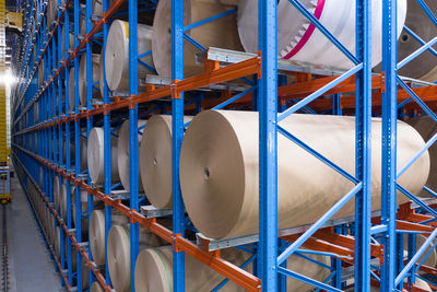 Stack of pipes against blue sky