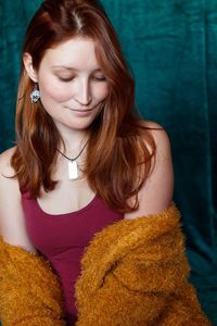 Smiling young woman wearing warm clothing