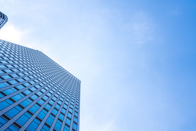 Low angle view of modern building against sky