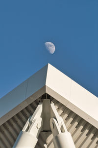 Low angle view of building against blue sky