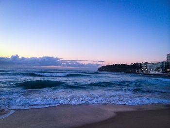 Scenic view of sea at sunset