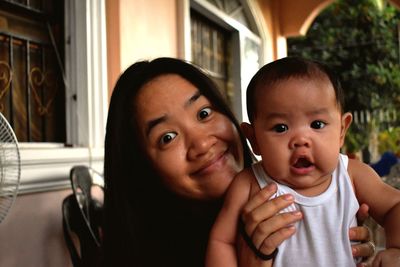 Portrait of mother and daughter