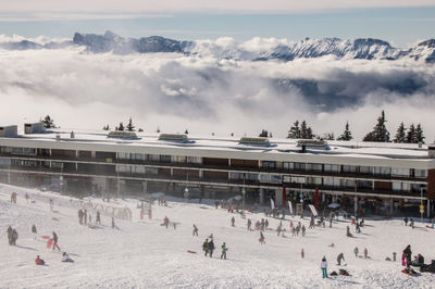 High angle view of people in ski resort in alps