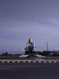 View of mosque against sky in city