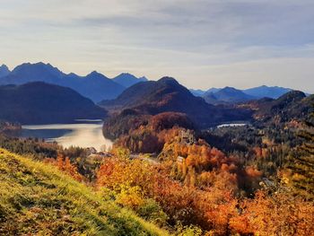 Scenic view of mountains against sky in schongau at autumn