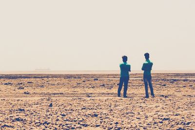 Scenic view of beach at dusk