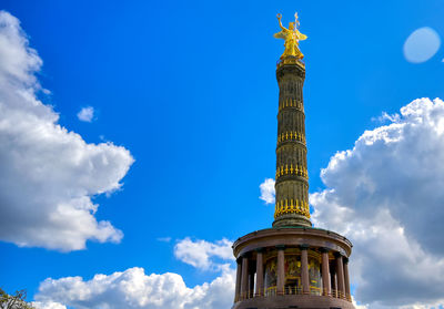 Low angle view of building against blue sky