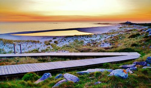 Scenic view of landscape at sunset