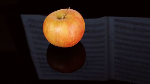 High angle view of apple on table