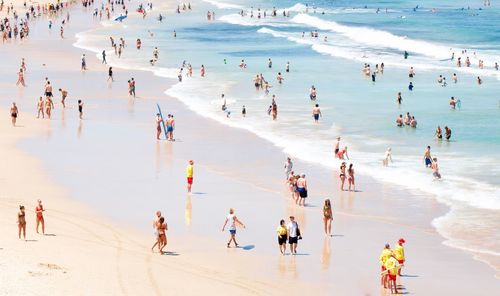 Group of people enjoying at beach