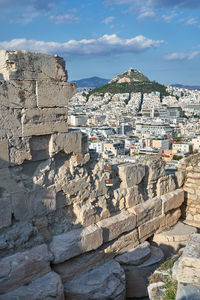 Buildings in city against sky