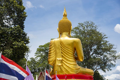 Low angle view of statue against sky