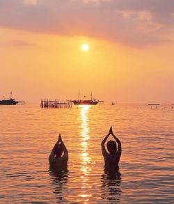 Scenic view of sea at sunset