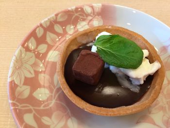 High angle view of cake in plate on table