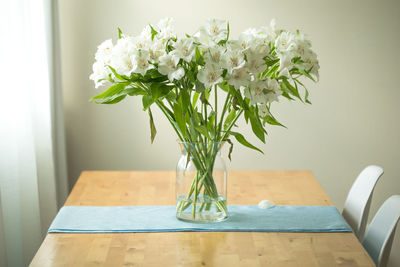 Potted plant on table at home