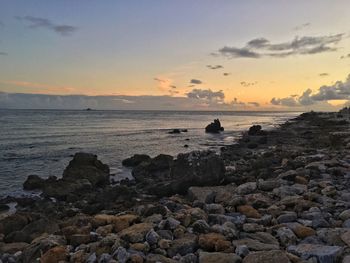 Scenic view of sea against sky during sunset