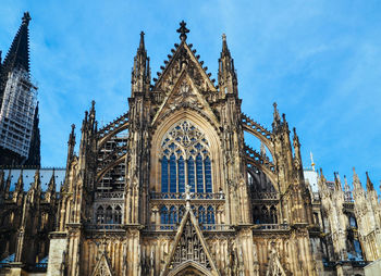 Low angle view of cologne cathedral against sky
