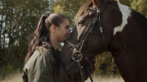 Close-up of teenage girl on land