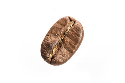 High angle view of bread against white background