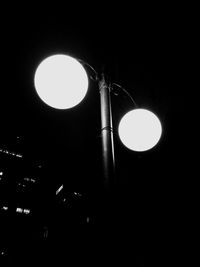 Low angle view of illuminated street light