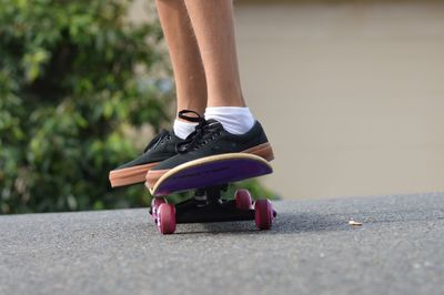 Low section of woman riding
