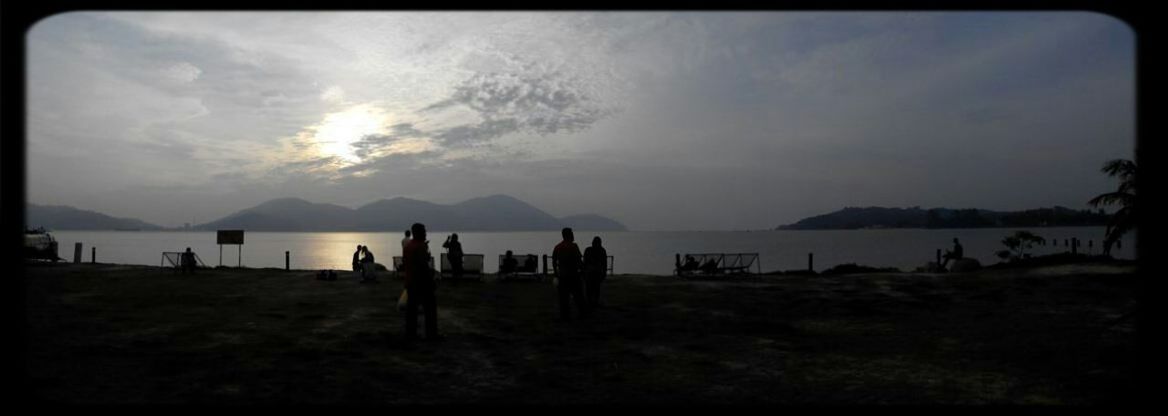 tranquil scene, water, sky, scenics, tranquility, sea, mountain, beauty in nature, beach, nature, cloud - sky, mountain range, idyllic, shore, sunset, cloud, panoramic, horizon over water, silhouette, non-urban scene