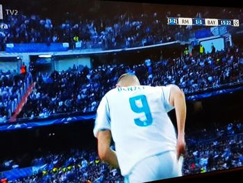 Rear view of people against the sky