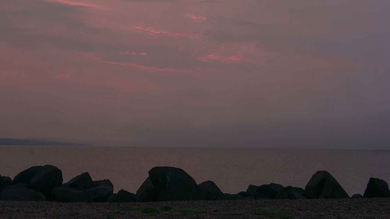 sky, sea, water, scenics - nature, cloud - sky, beauty in nature, tranquility, tranquil scene, rock, horizon over water, sunset, horizon, nature, solid, dusk, rock - object, no people, land, non-urban scene, outdoors