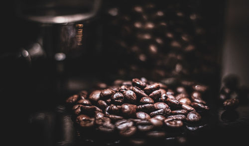 Close-up of coffee beans on table