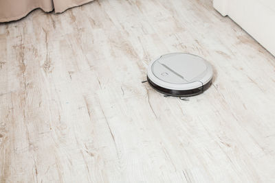 High angle view of clock on table at home