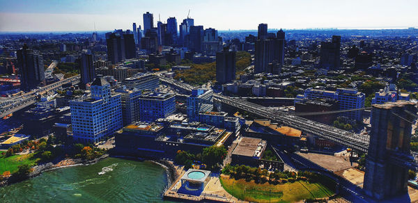 High angle view of river amidst buildings in city