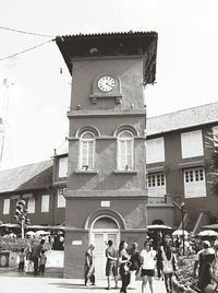 Woman standing in city