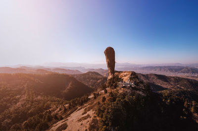 Scenic view of rock formations against sky