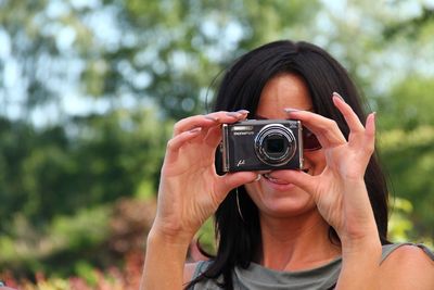 Photographer photographing camera