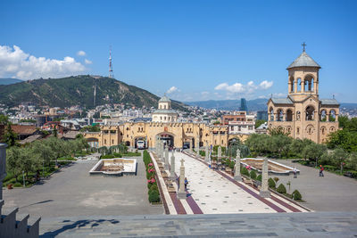 View of buildings in city against sky