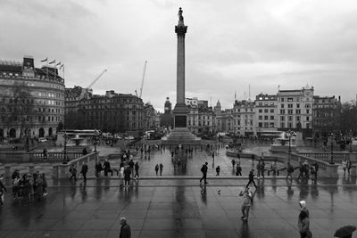 Group of people in front of buildings