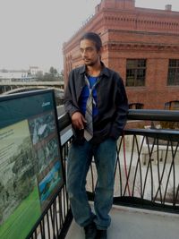 Full length of young man standing outdoors