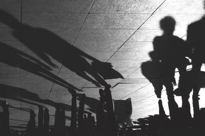 Shadow of people on wall