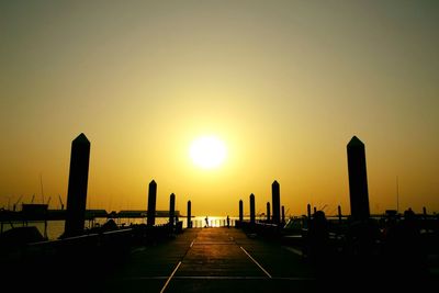 Silhouette of city during sunset