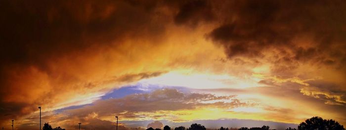Low angle view of dramatic sky during sunset