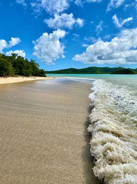 Perfect beach day as the waves roll in 